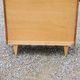 Chest of drawers from the 50s-60s in golden mahogany 4 drawers feet bobbin
