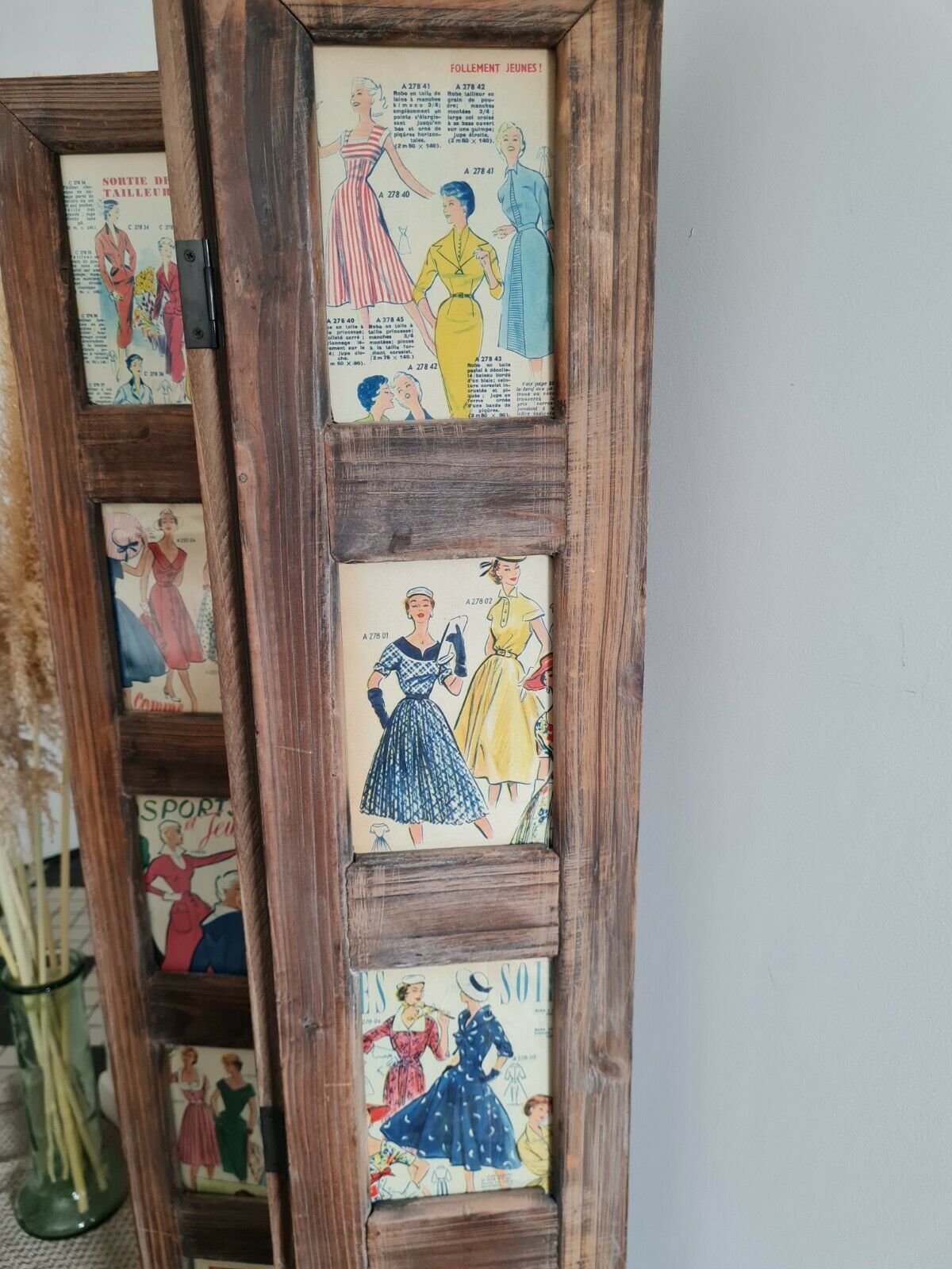 Wooden screen with vintage haute couture images or for photos