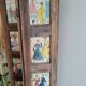 Wooden screen with vintage haute couture images or for photos