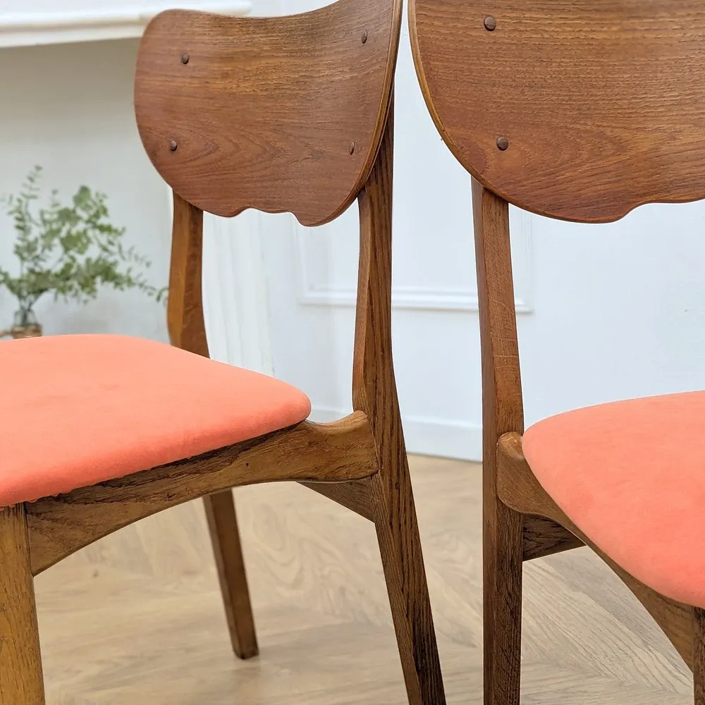 Pair of vintage orange Scandinavian chairs