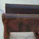 Vintage magazine rack in oak and antique leather