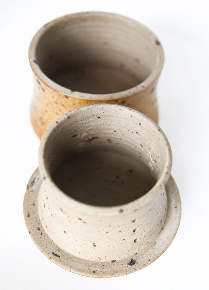 Handmade and rustic water butter in pyrity sandstone