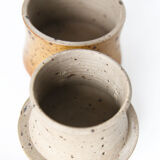 Handmade and rustic water butter in pyrity sandstone