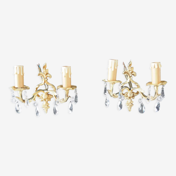 Pair of gilded bronze sconces and crystal tassels