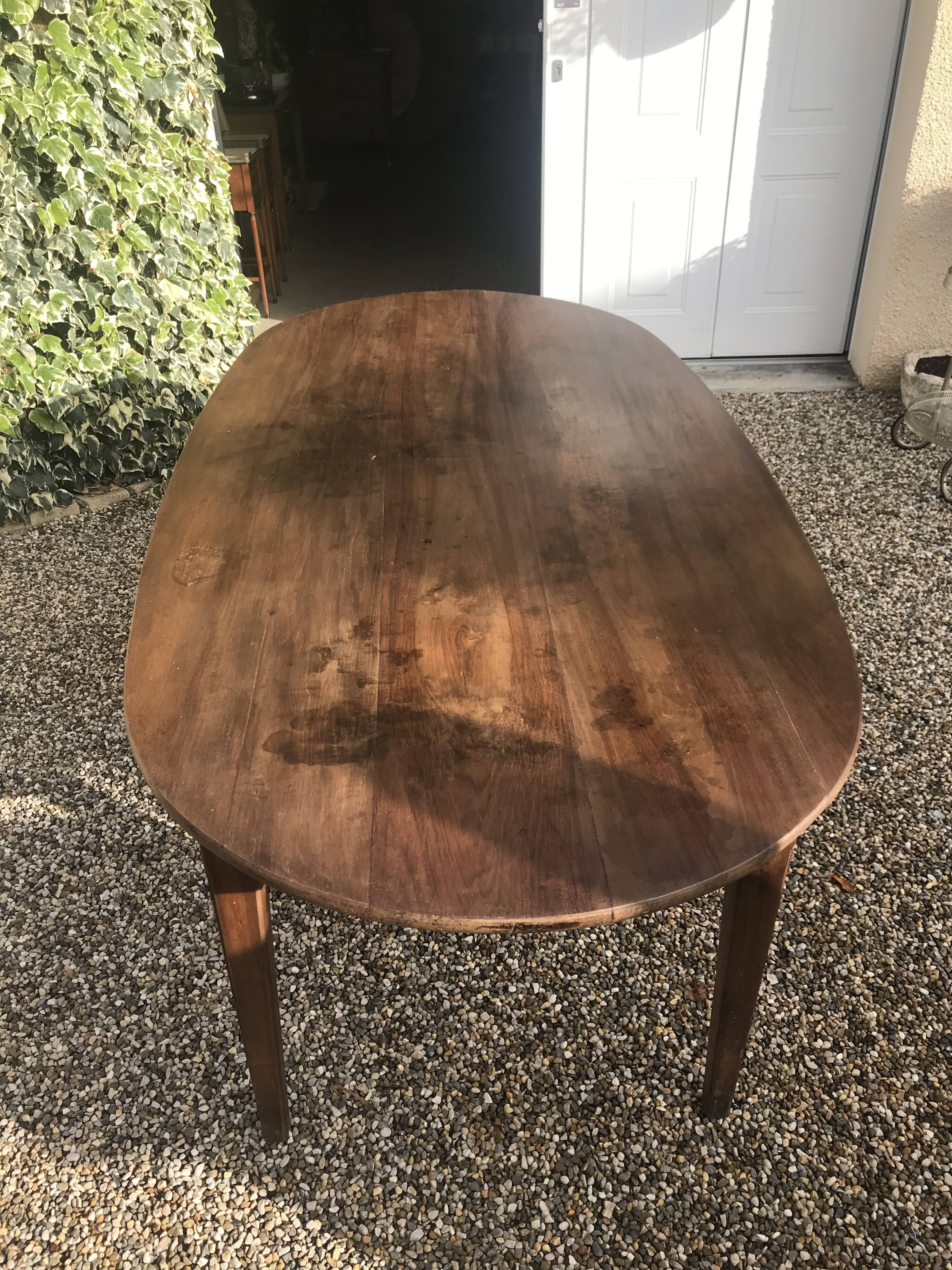 Oval farm table in massive walnut