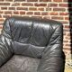 Pair of patinated leather club armchairs