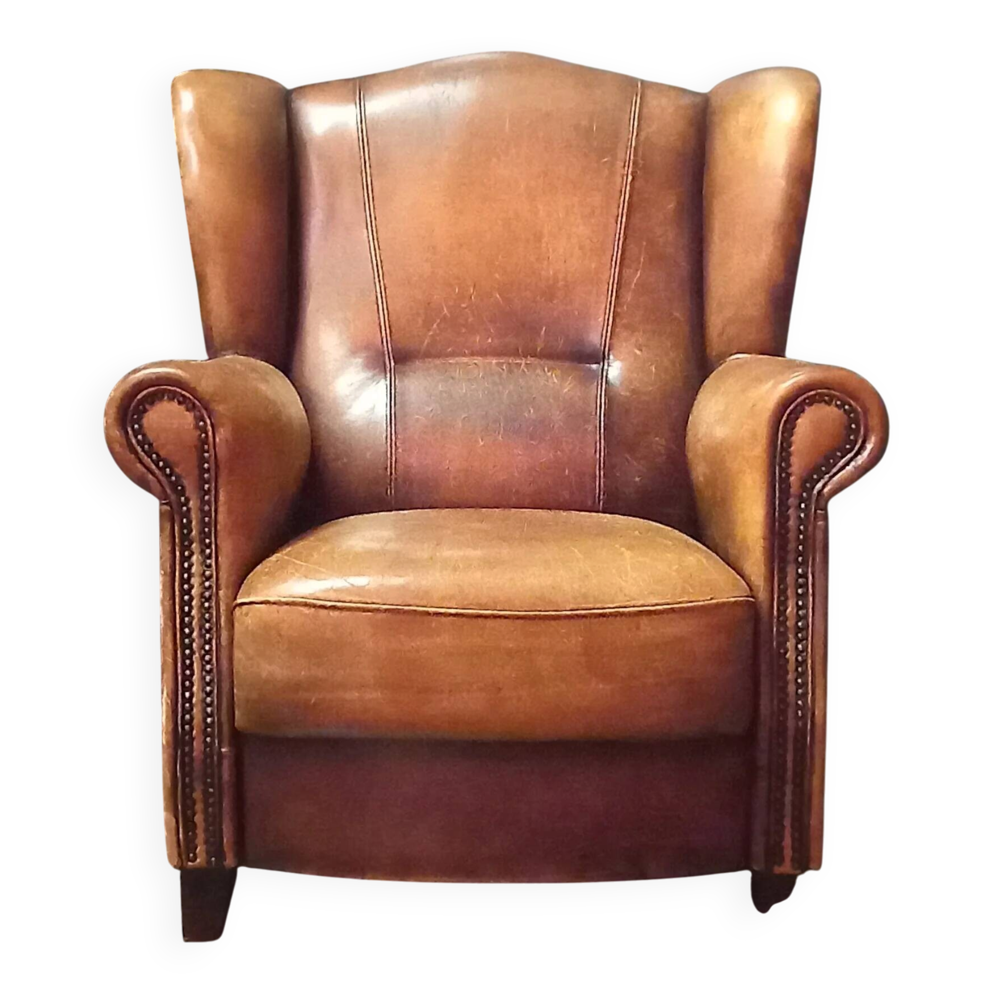 Robust vintage sheepskin armchair