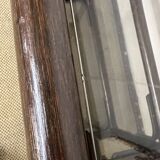 Rattan and smoked glass bookcase shelf