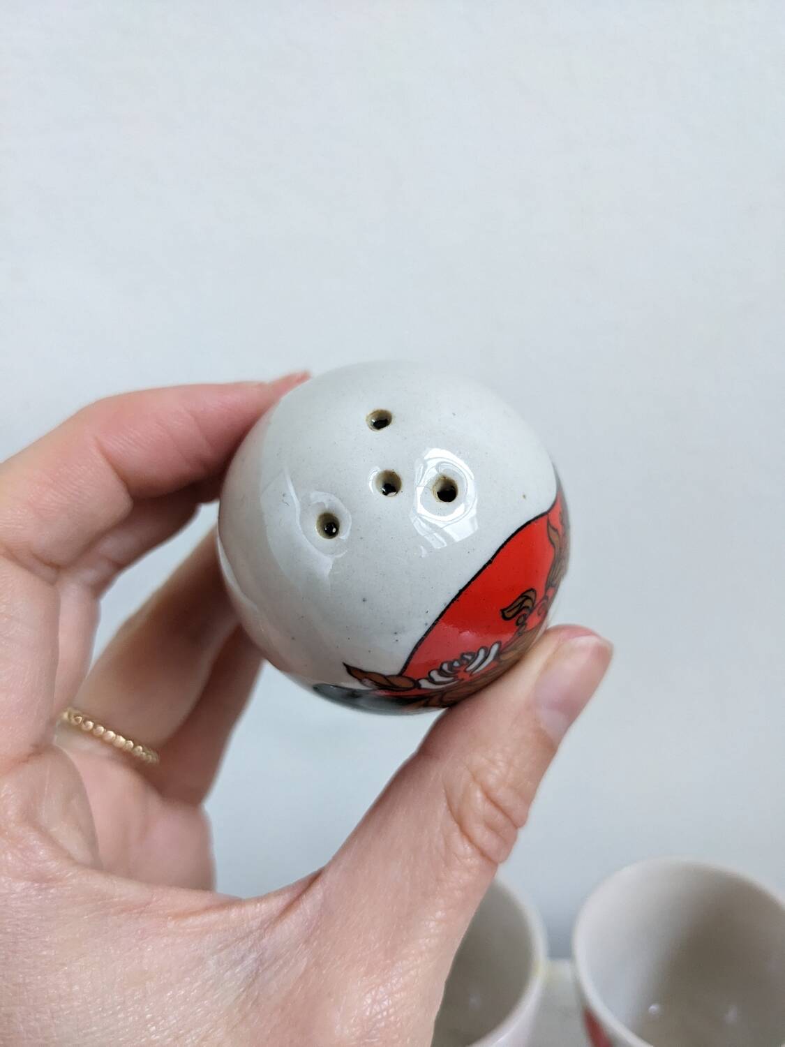 Egg cup, salt and pepper shaker duo