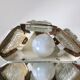 Scandinavian midcentury wall light in crystal and mat gold colored metal