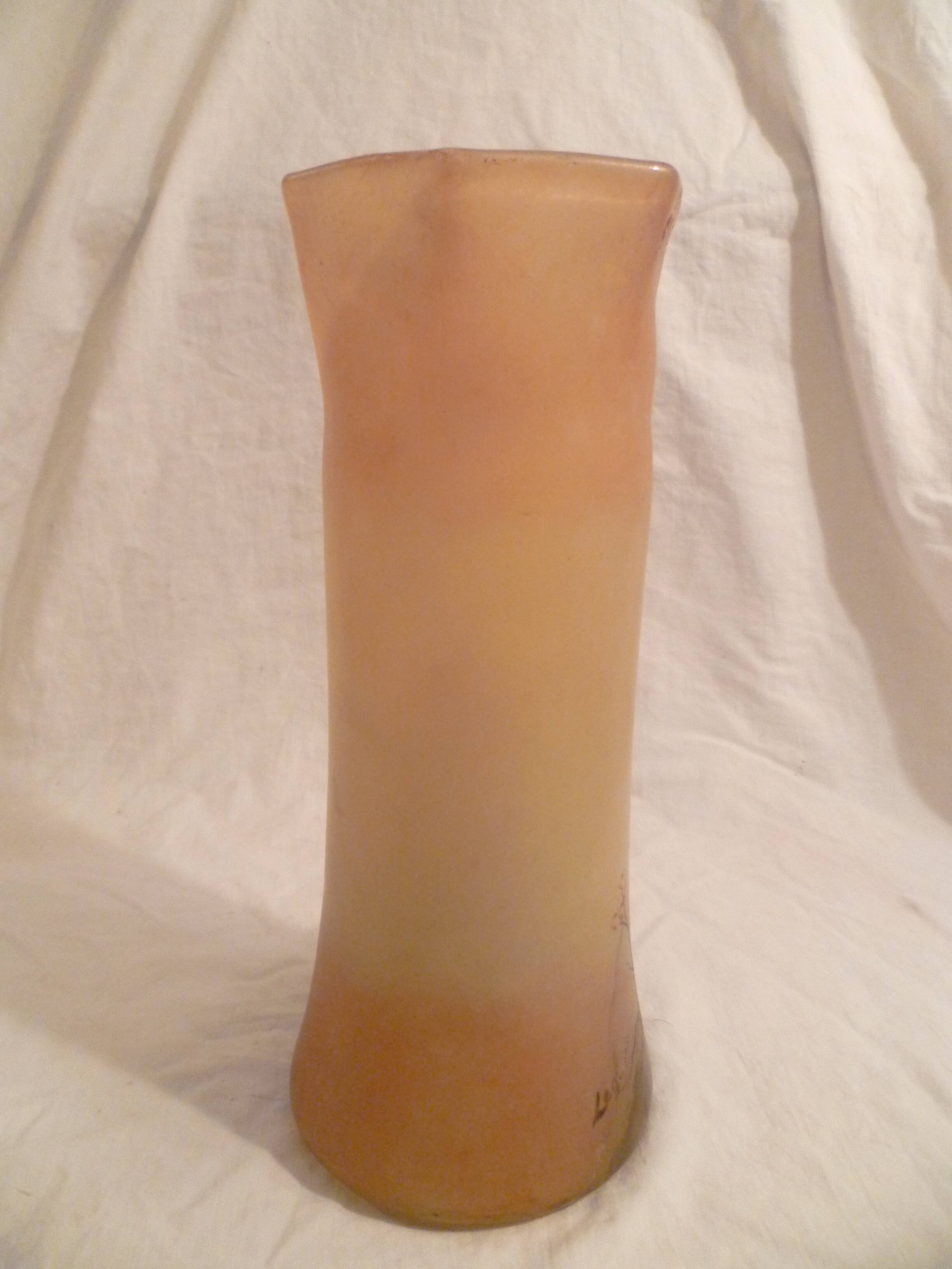 Blown glass vase with painted underbrush decoration marked "leg"