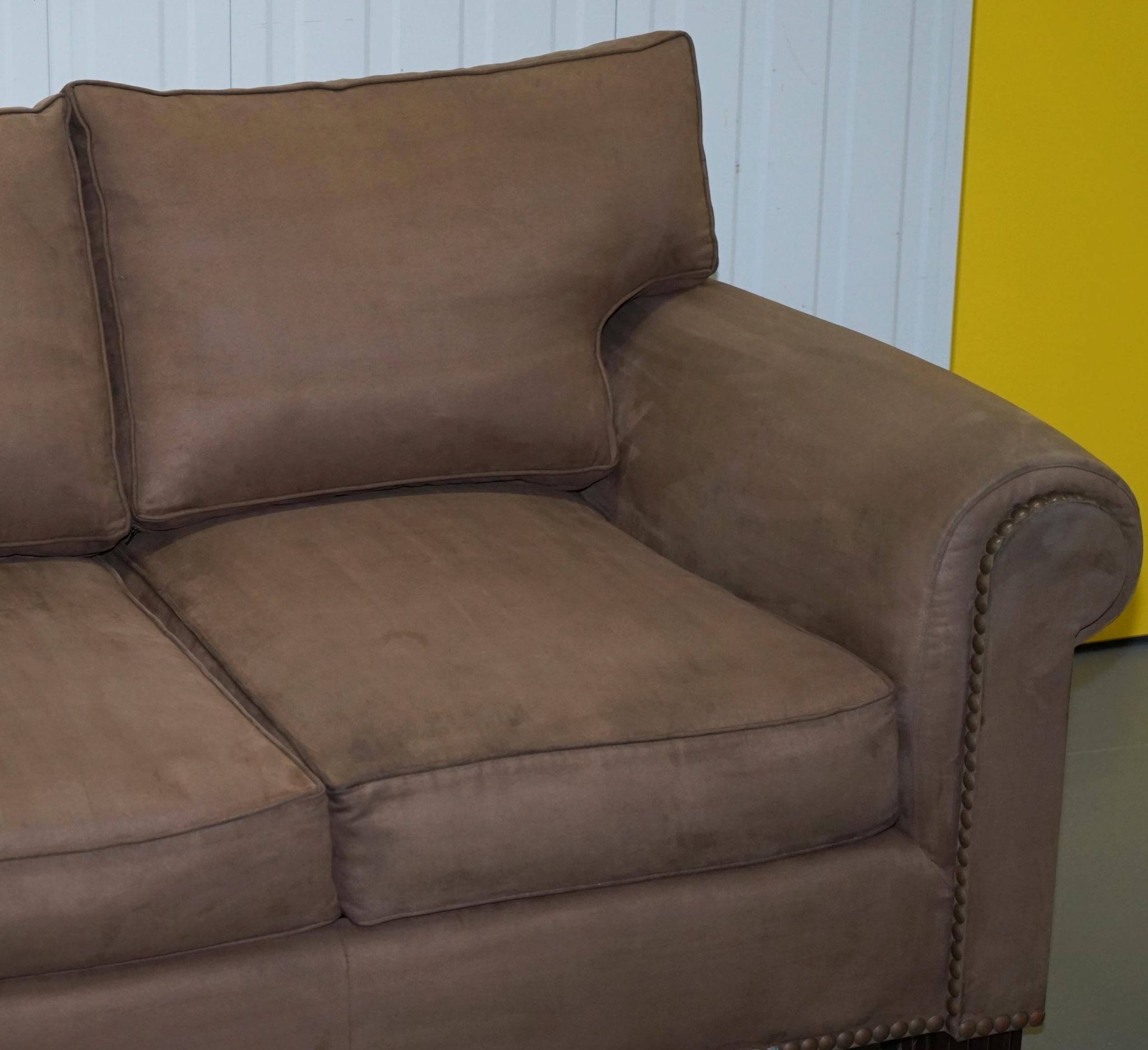 Ralph Lauren Jamaica velvet sofa pair with feather cushions.