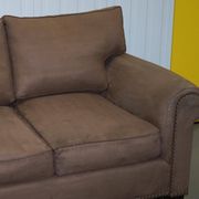Ralph Lauren Jamaica velvet sofa pair with feather cushions.