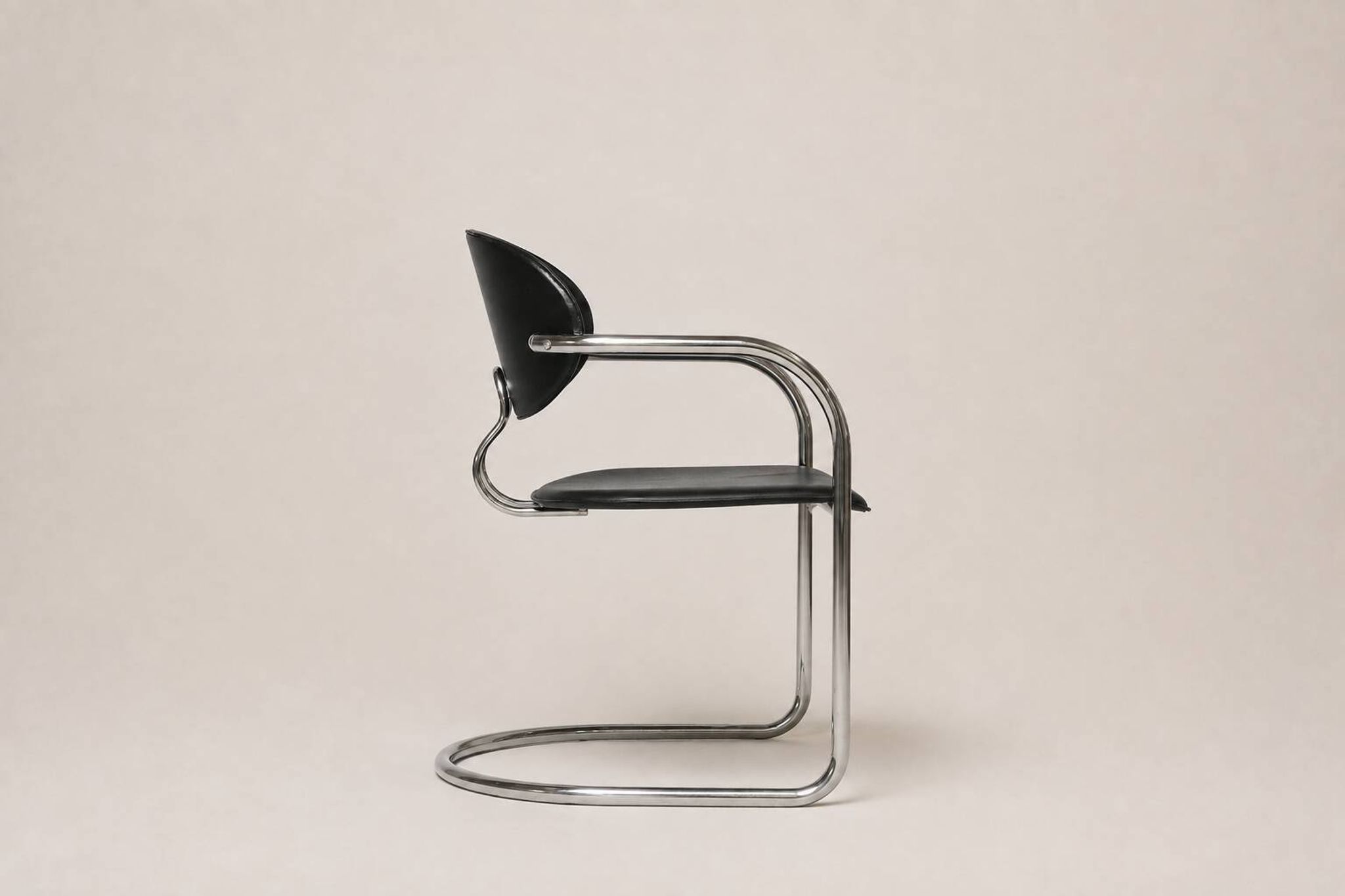 Set of eight cantilever chairs in black faux leather and chrome steel — c. 1980