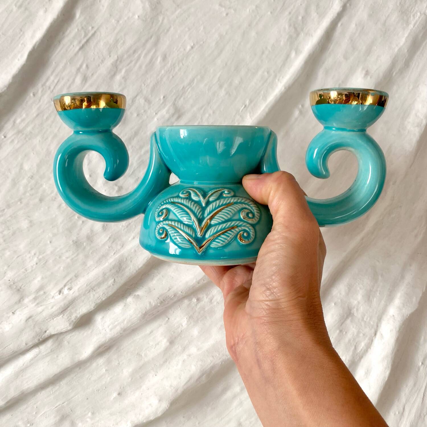 Pair of turquoise and gold double candlesticks