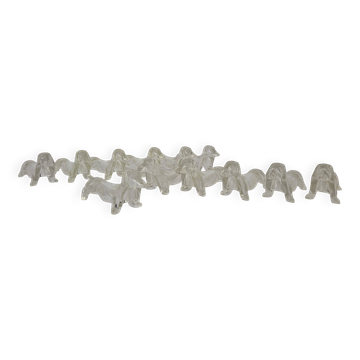 12 plastic dachshund/bassett knife holders 1970s