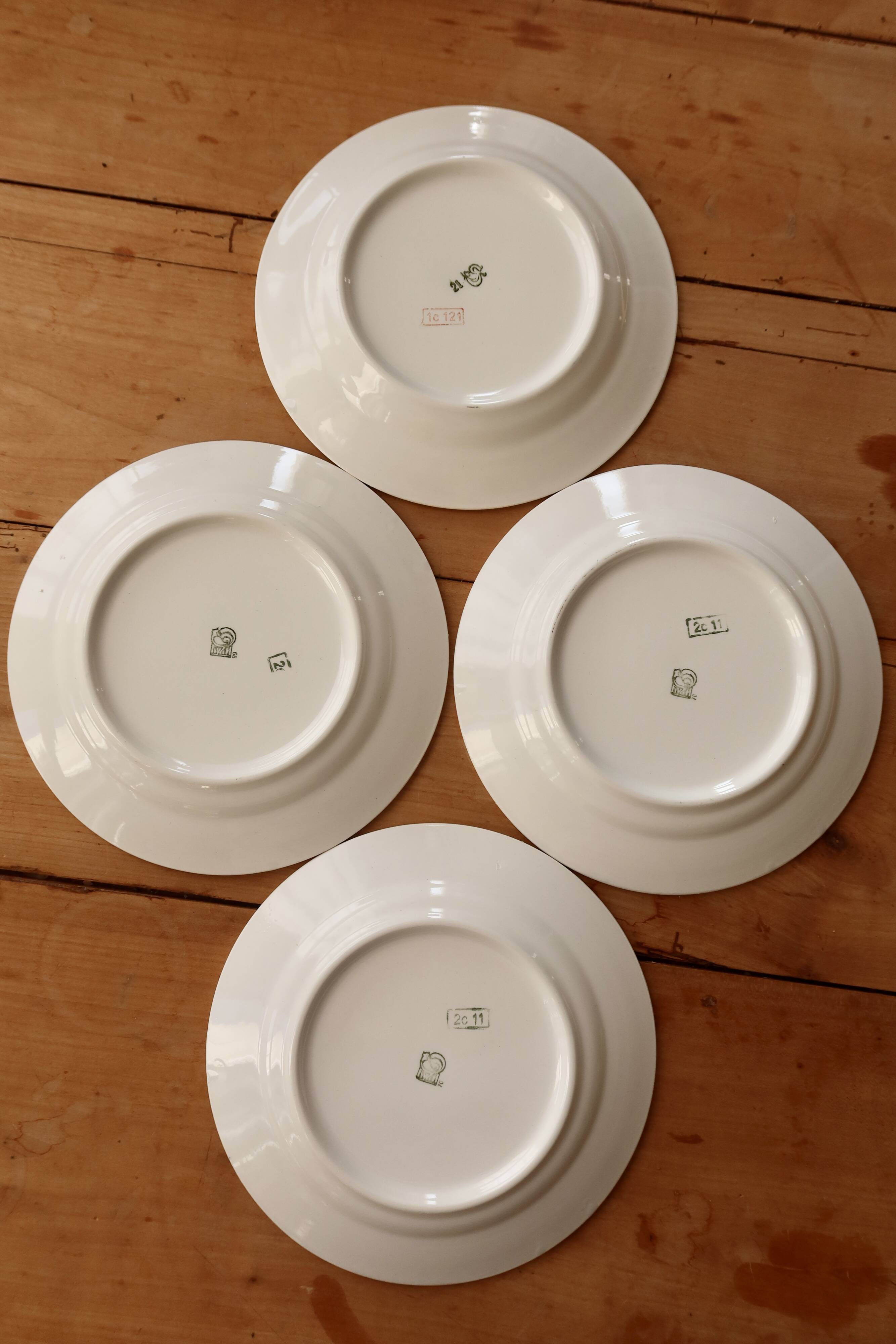 4 assiettes à dessert vintage en faïence motif fleuri