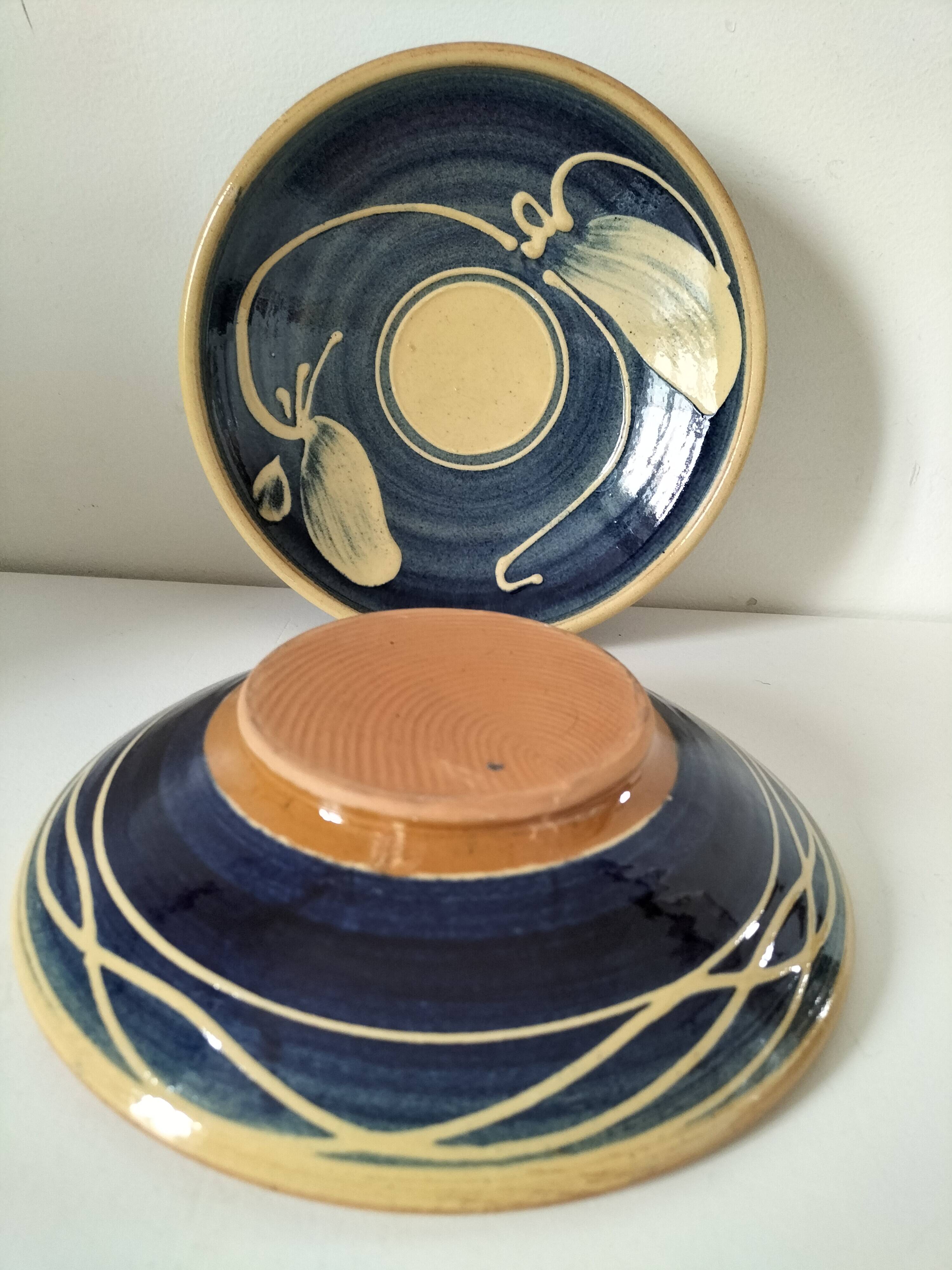 Pair of handcrafted bowls by Le Fer Rouge with blue and beige decor