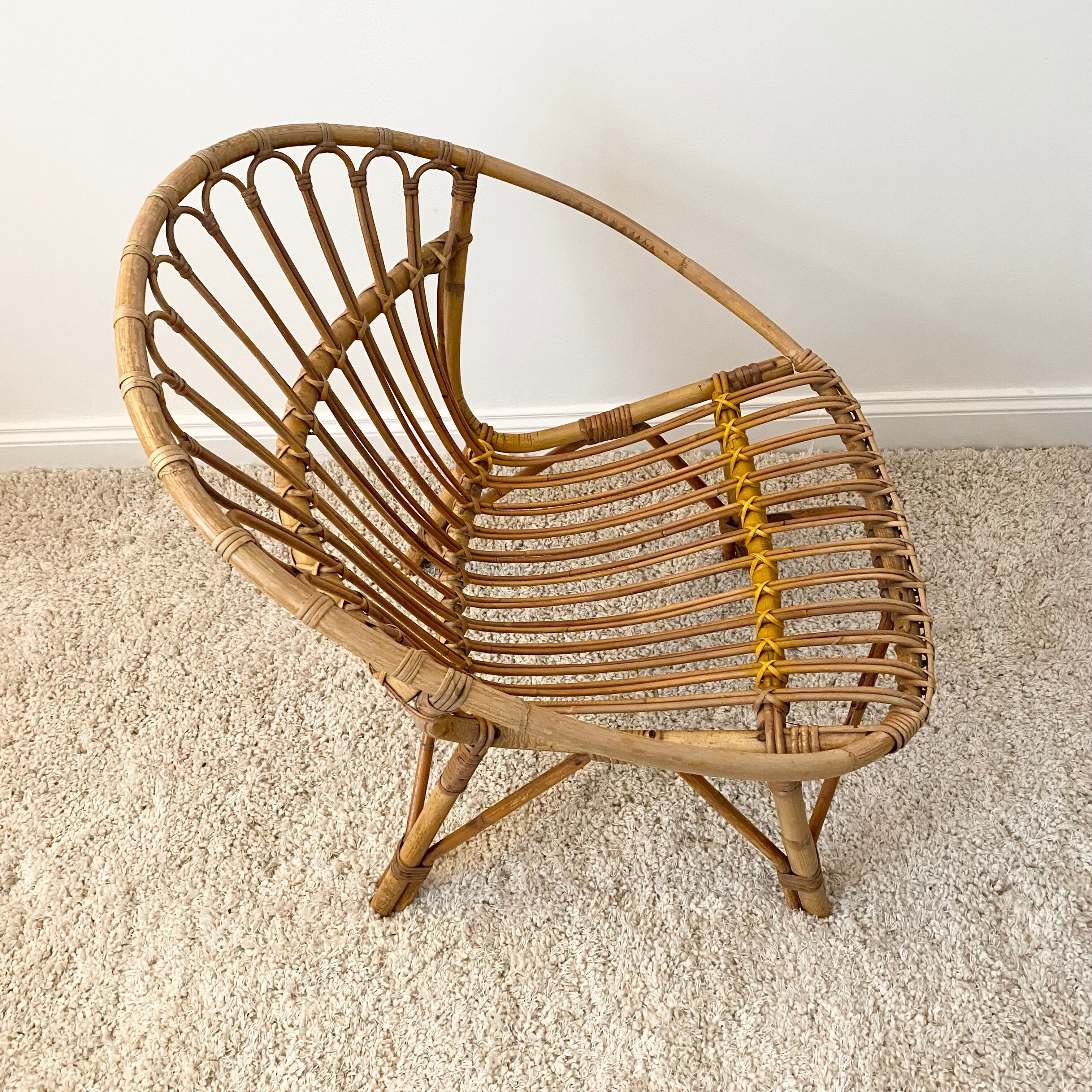 Vintage rattan shell armchair