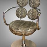 Pair of italian swivel armchairs in chrome-plated metal and piton imitation fabrics