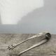 Silver-plated metal sugar tongs