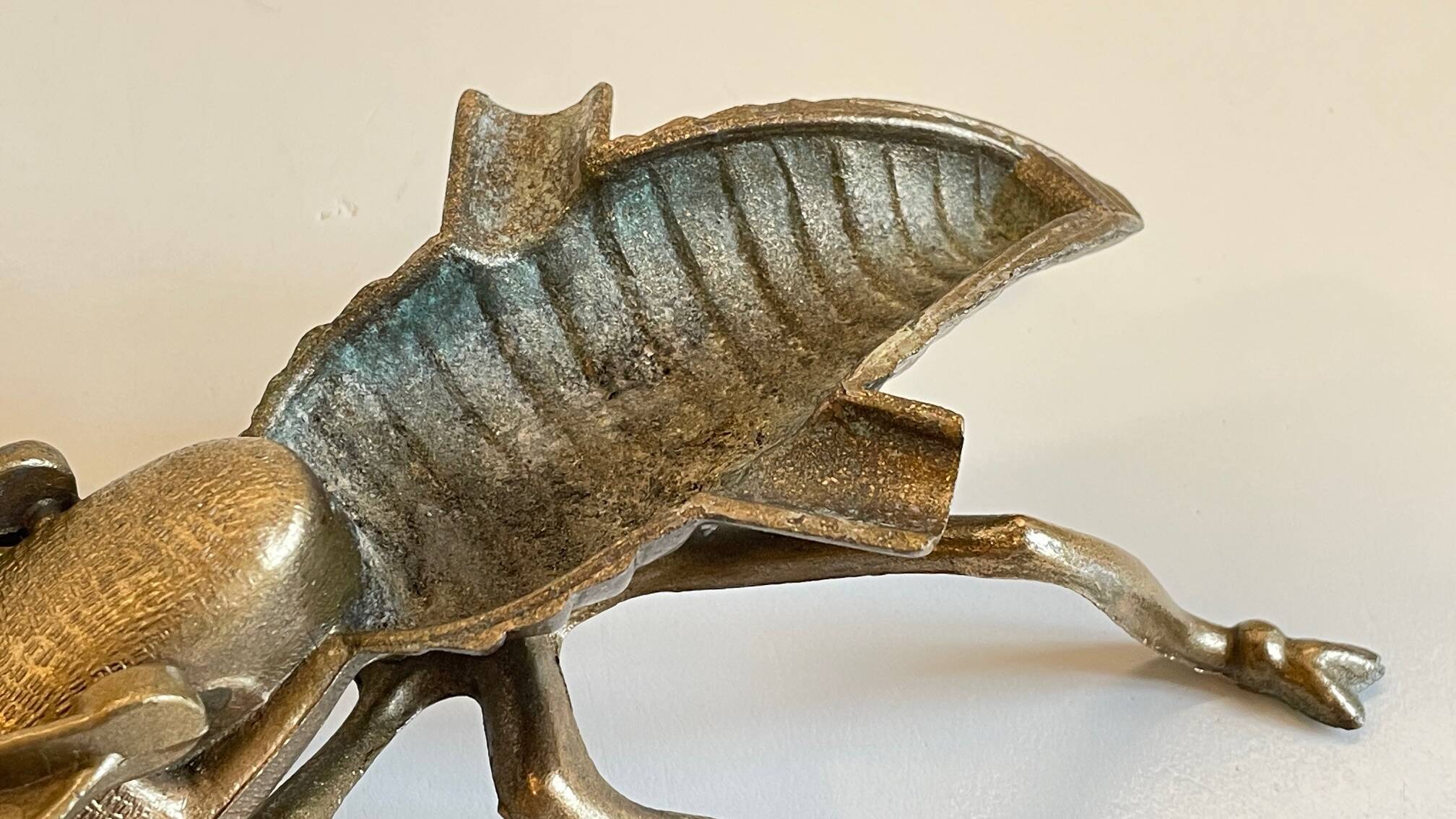 Vintage fly ashtray in patinated metal