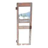 Mirror (3 panels) on door.