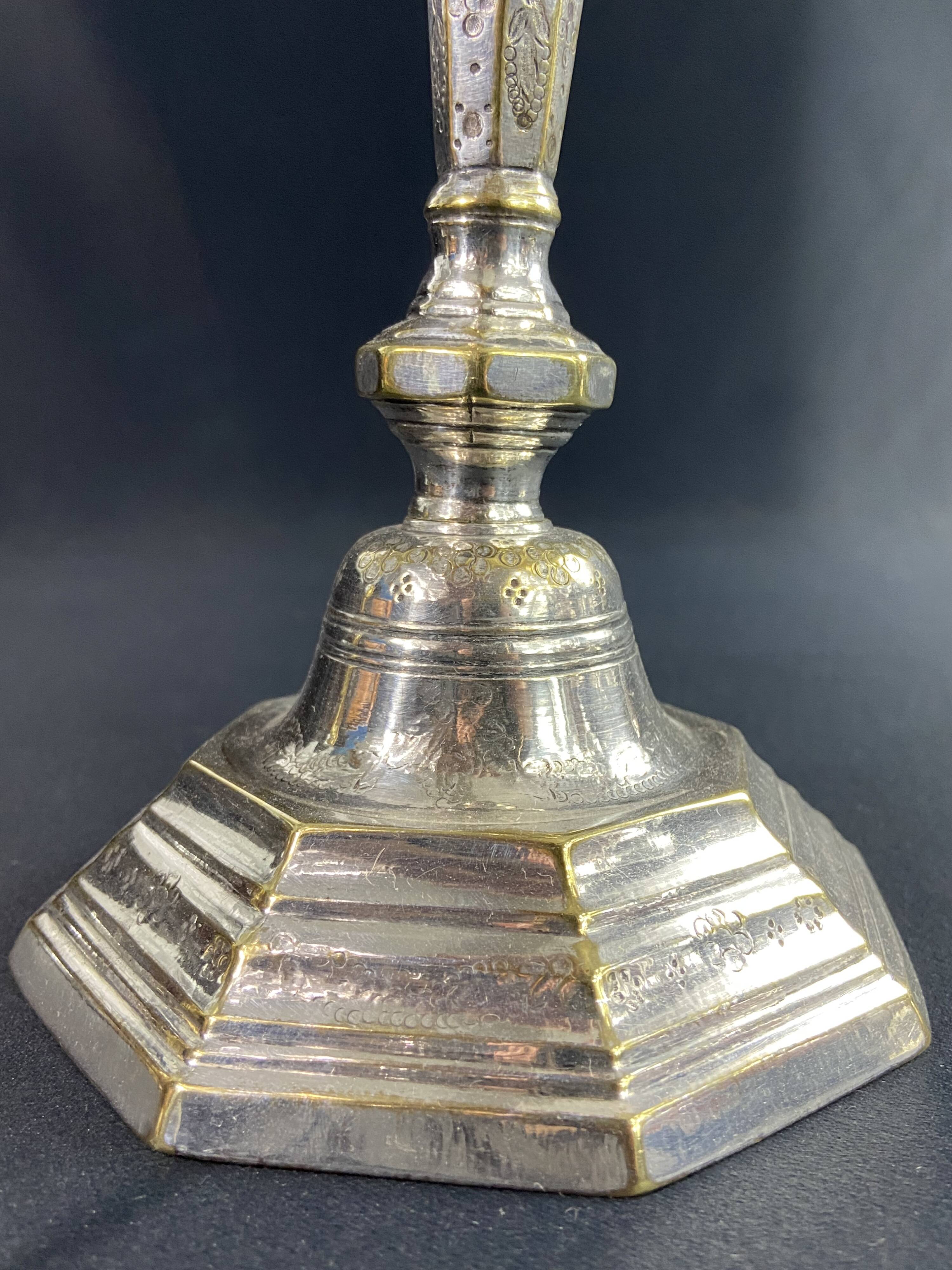 18th century Regency candlestick in silvered bronze with chiseled floral decoration