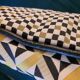 Coussins graphiques passepoil cuir