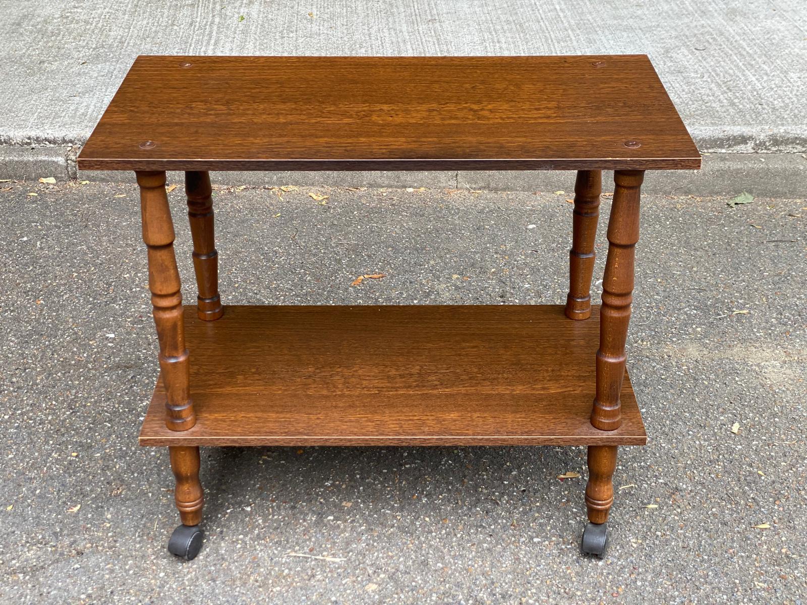Vintage wooden rolling dessert trolley from the 1980s.