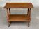 Vintage wooden rolling dessert trolley from the 1980s.