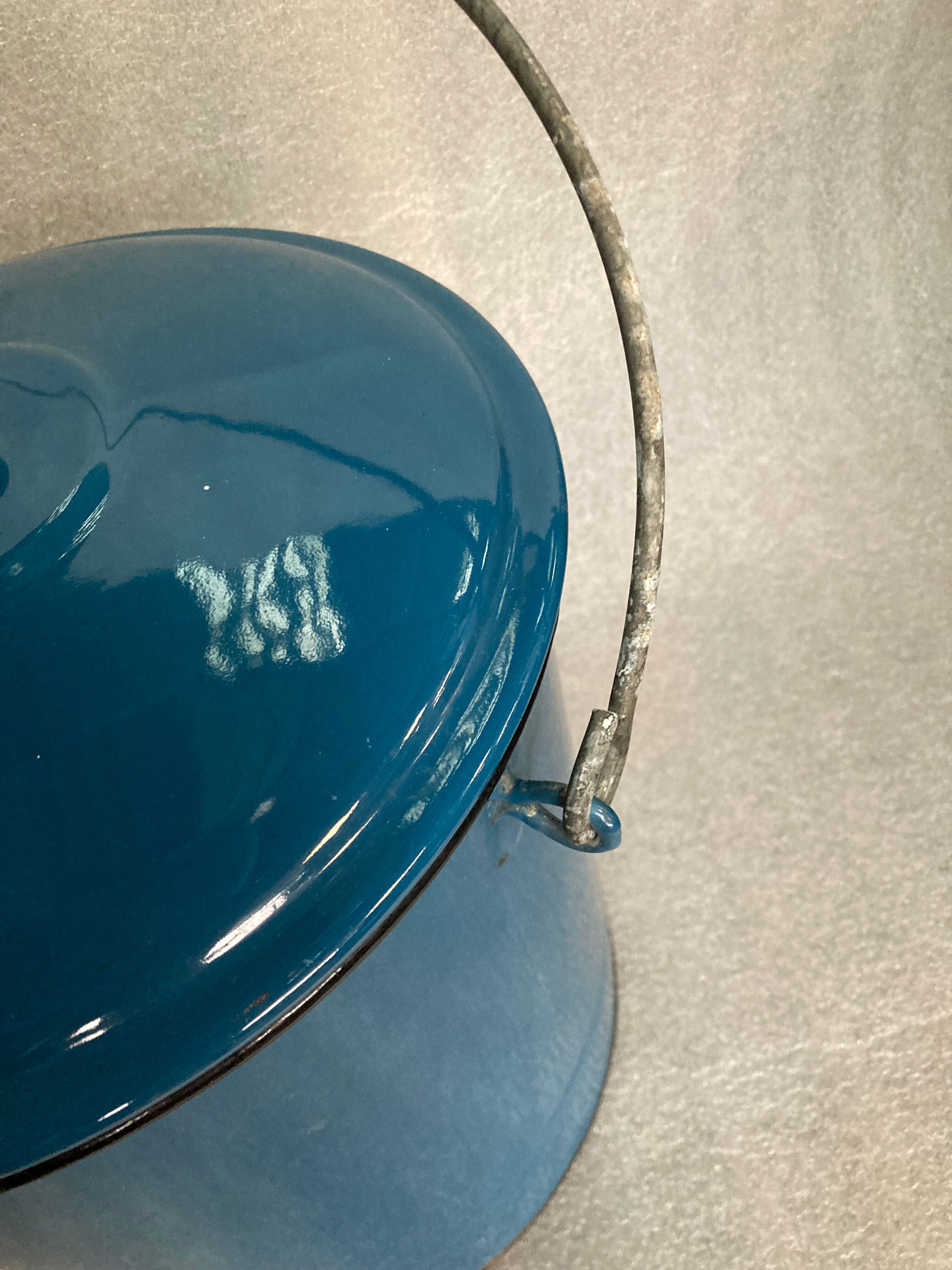 Enamelled blue bucket