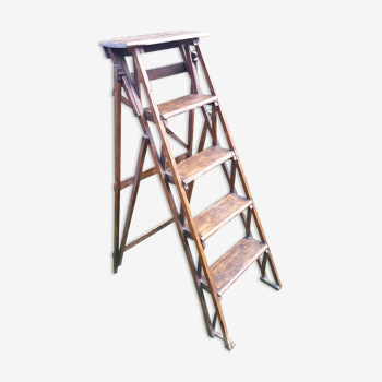 Old renovated folding painter stepladder