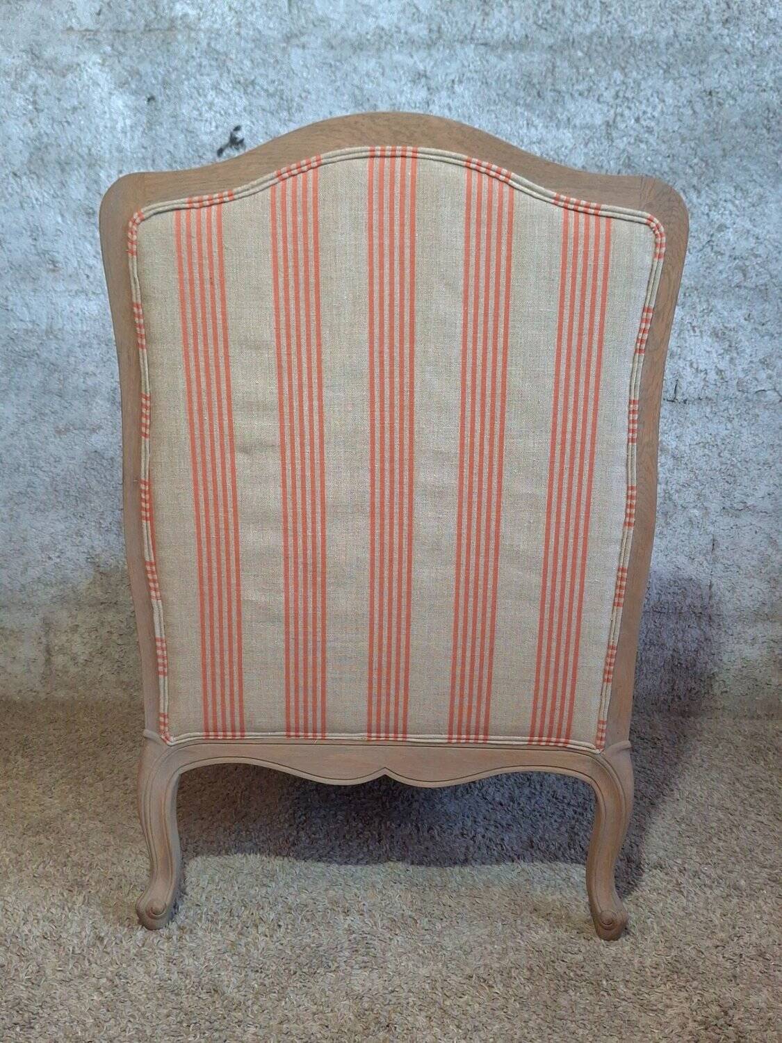 Louis XV bergère style, cerused, reupholstered in coral striped linen – Very good condition.