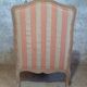 Louis XV bergère style, cerused, reupholstered in coral striped linen – Very good condition.
