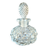 Old perfume bottle in molded