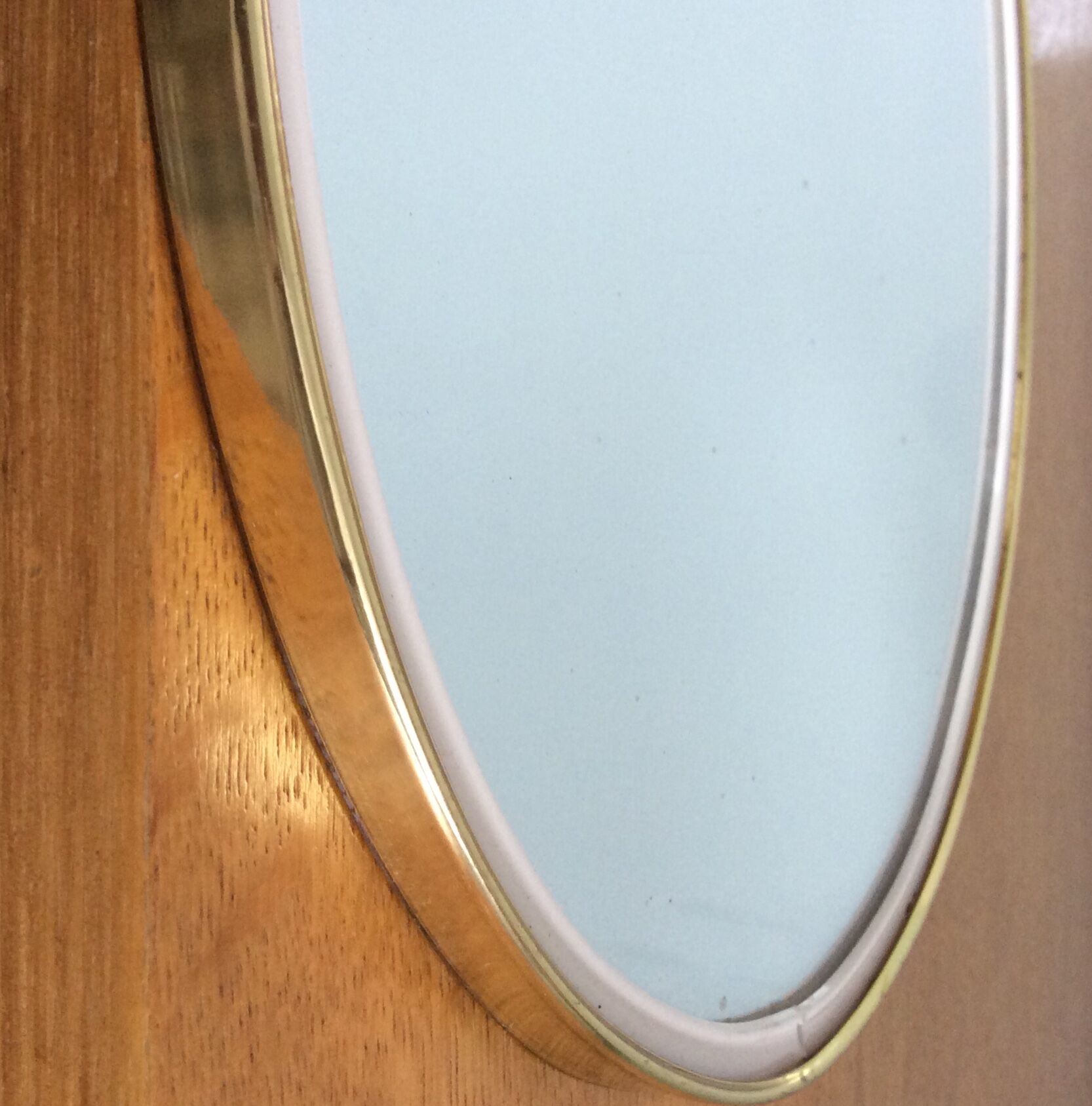 Free-form oval sheathed mirror from the 60s and 70s