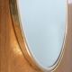 Free-form oval sheathed mirror from the 60s and 70s