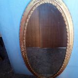 Oval mirror 134cm wood and gilded stucco early 20th century