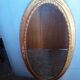Miroir ovale 134cm bois et stuc doré debut XXem