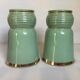 Pair of antique green and gold ceramic vases
