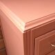 Pretty vintage salmon chest of drawers.