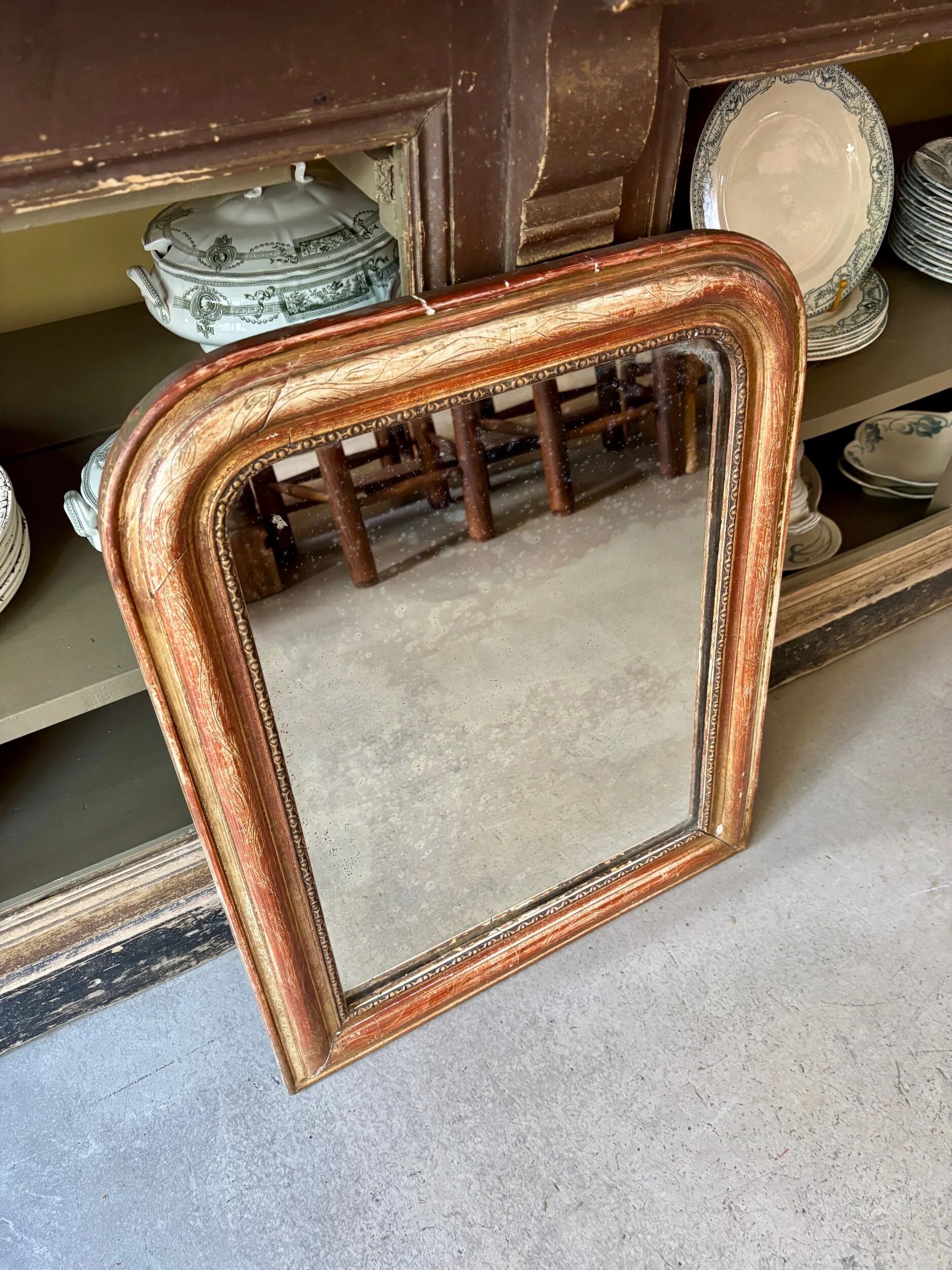 Louis Philippe mirror in gilded stucco ☐ 63.5 x 51 cm