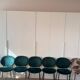 Set of 10 Calligaris Ines chairs in green velvet and tropical fabric.