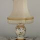 Table lamp with wooden base and fringed shade
