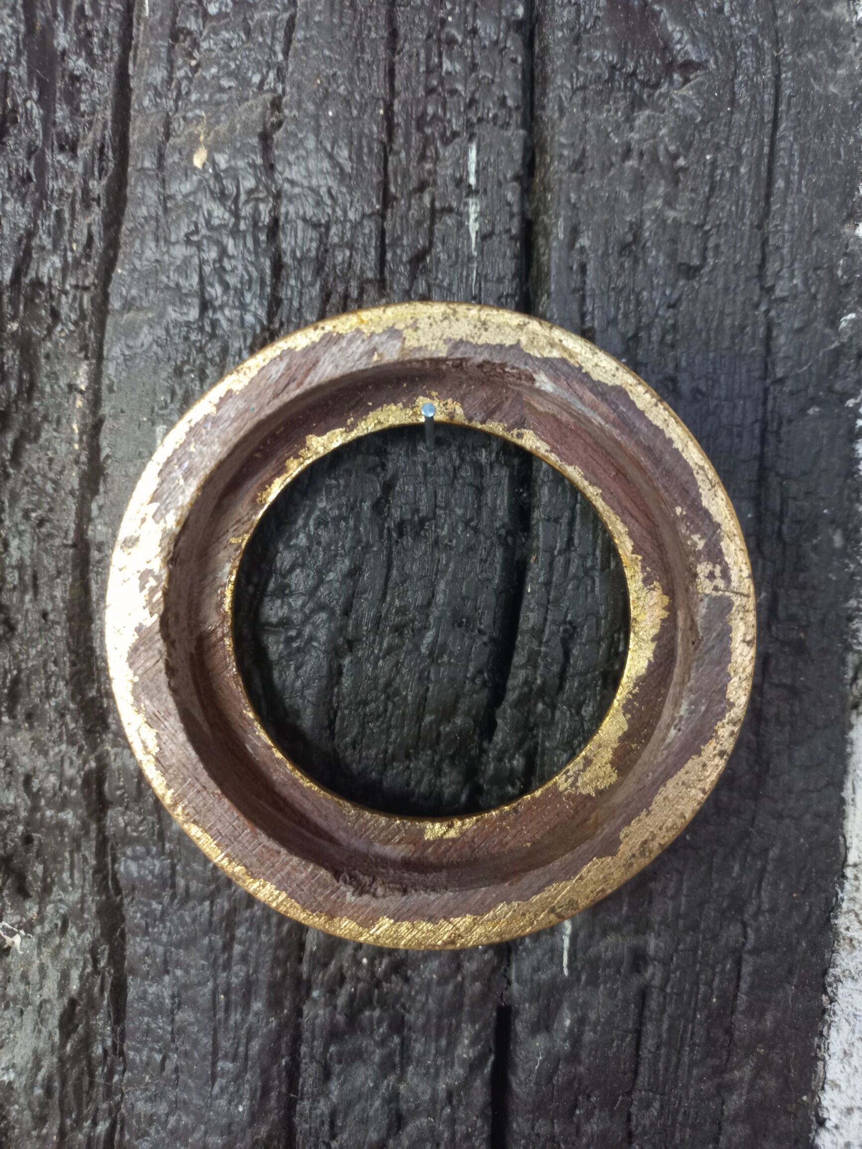Pair of small round gilded frames