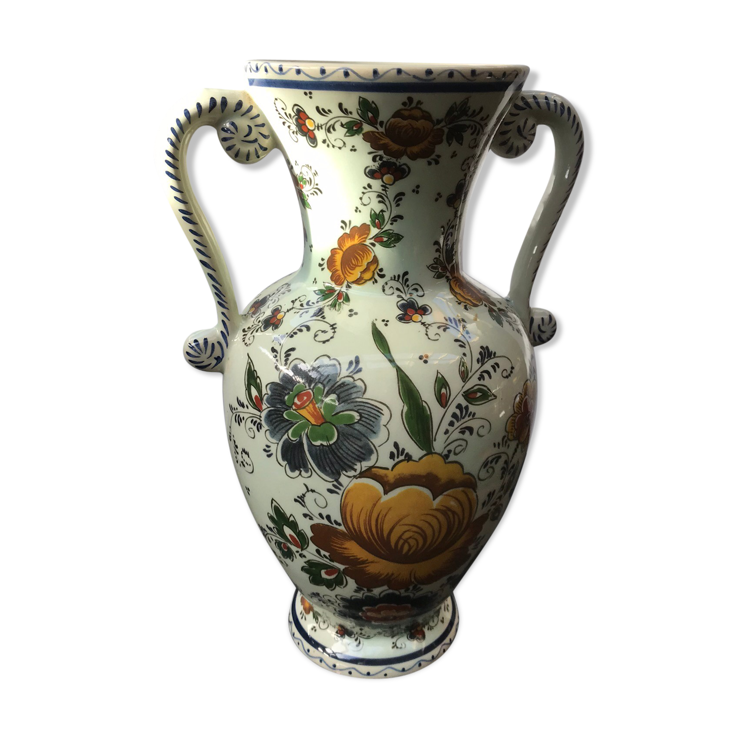 Ancient Delft vase with white ceramics decor vintage flowers