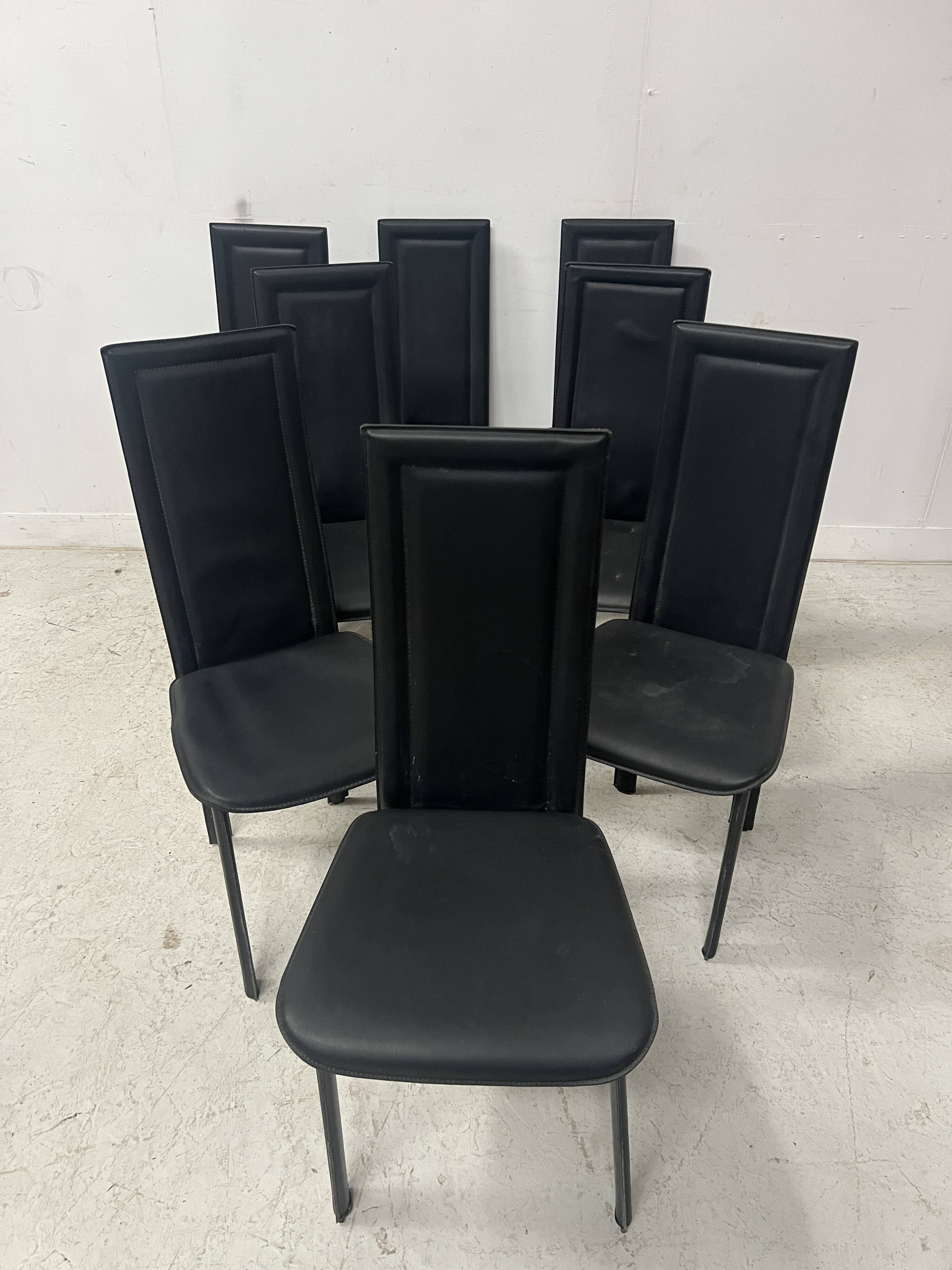 Set of eight designer chairs in black leather from the 20th century