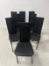 Suite de huit chaises design en cuir noir XX siècle