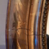 Golden wood oval mirror 50x61cm